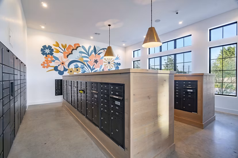 Mail room featuring secure package lockers at Citizen House MLK Apartments