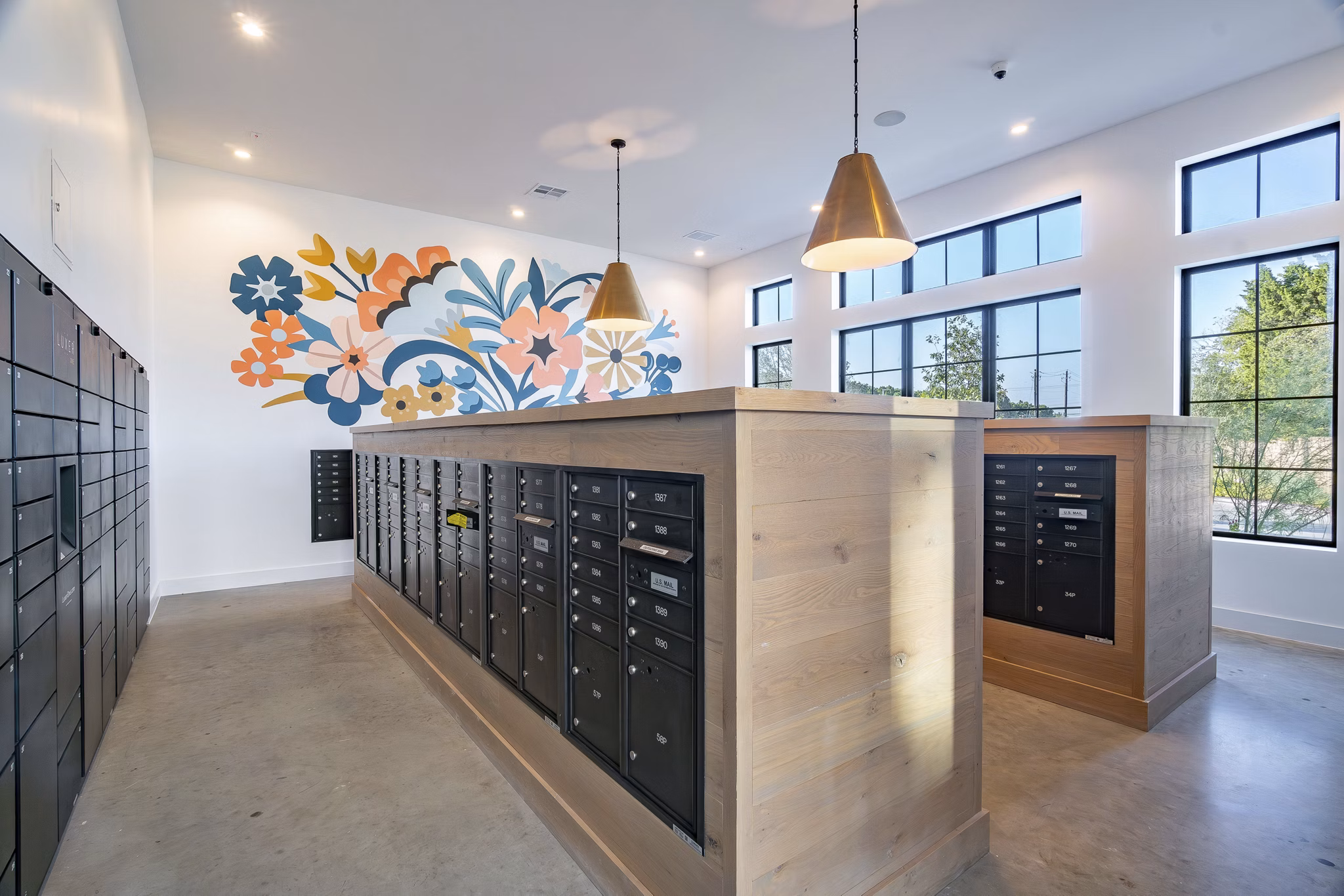 Mail room featuring secure package lockers at Citizen House MLK Apartments