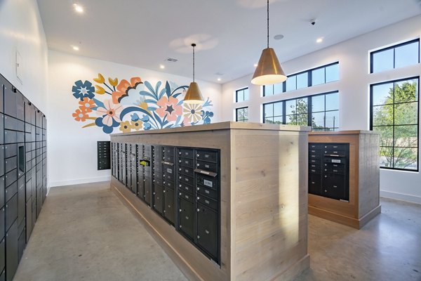 Mail room featuring secure package lockers at Citizen House MLK Apartments