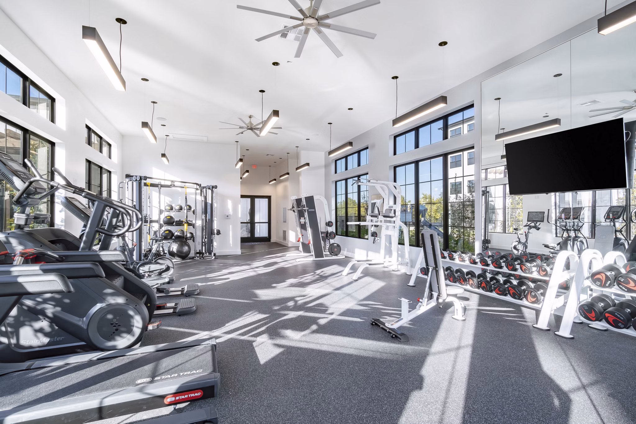 State-of-the-art fitness center with modern equipment at Citizen House MLK Apartments, promoting a healthy lifestyle in vibrant Austin