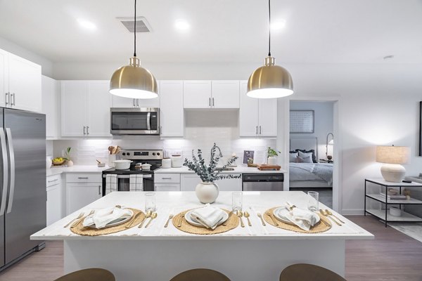 Modern kitchen with stainless steel appliances at Citizen House MLK Apartments, high-quality Greystar luxury living