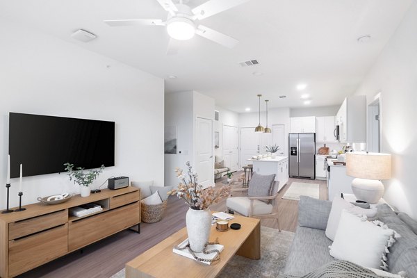 Bright living room with modern decor at Citizen House MLK Apartments
