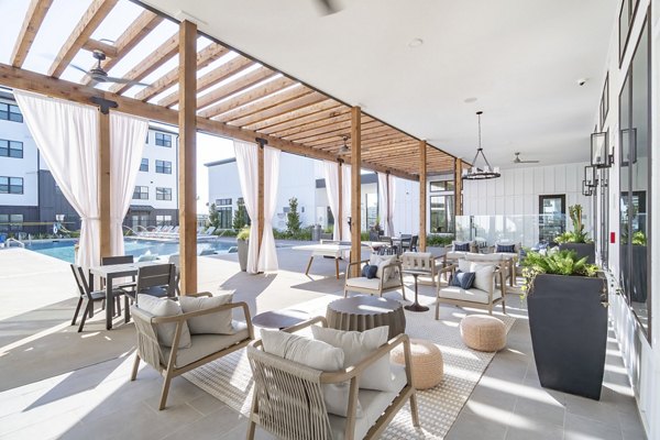 Patio with modern outdoor seating at Citizen House MLK Apartments