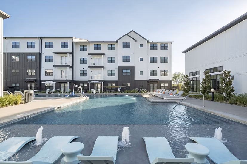 Rooftop pool with city views at Citizen House MLK Apartments, offering luxury living and community events