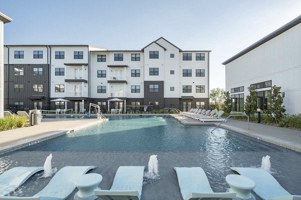 Rooftop pool with city views at Citizen House MLK Apartments, offering luxury living and community events