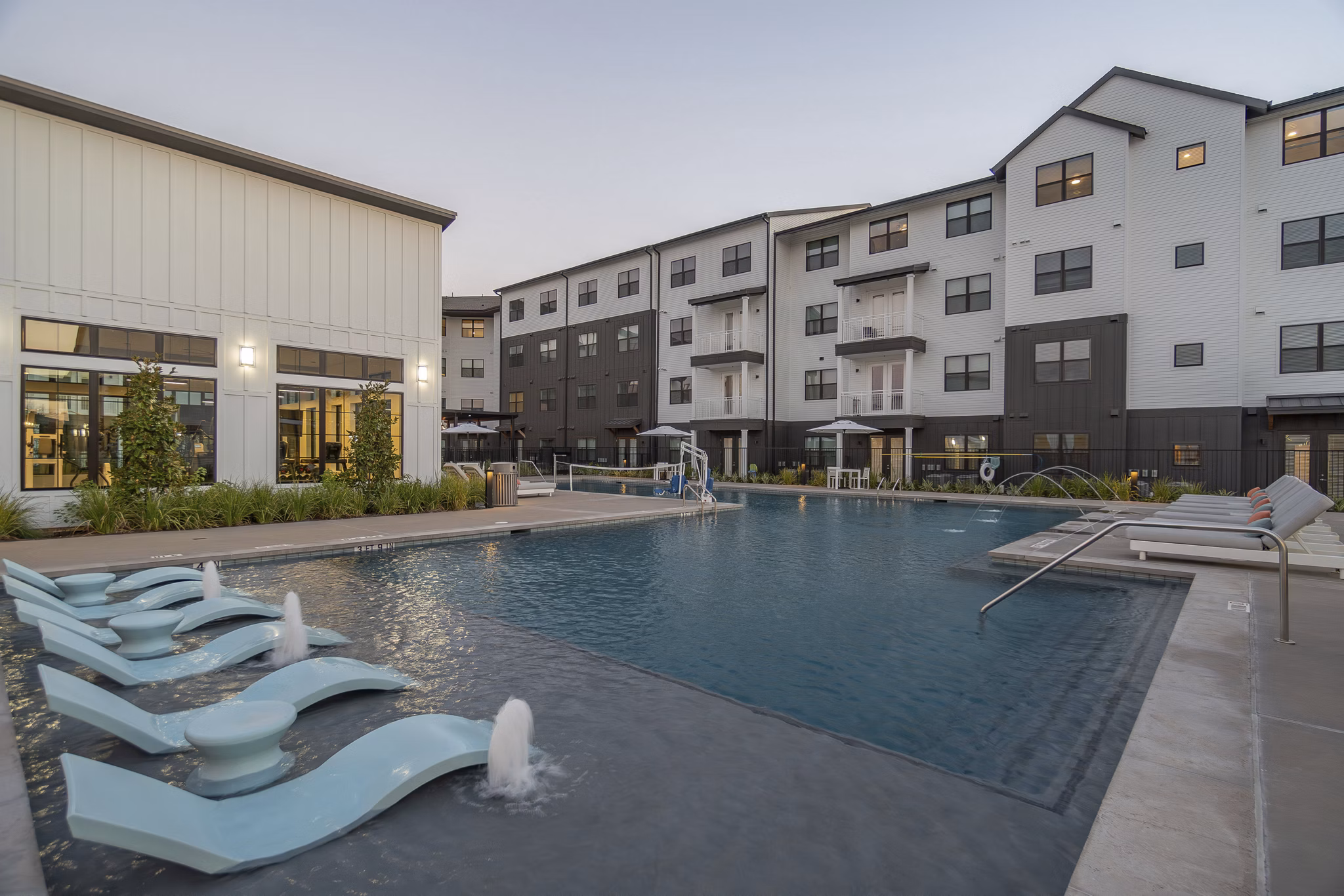 Resort-style pool at Citizen House MLK Apartments offering luxury leisure in a well-appointed outdoor space