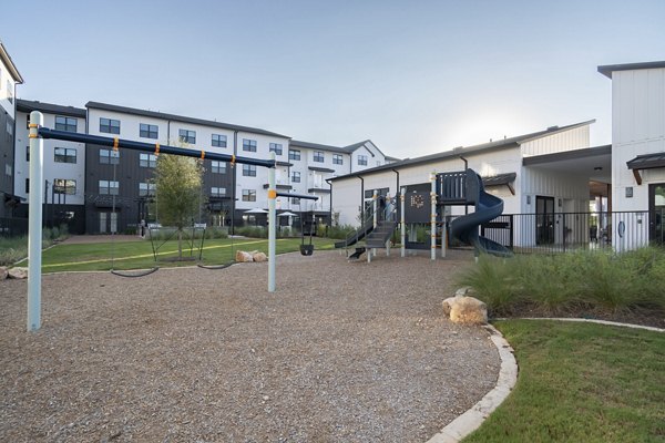 Modern playground at Citizen House MLK Apartments offering safe recreational space for families