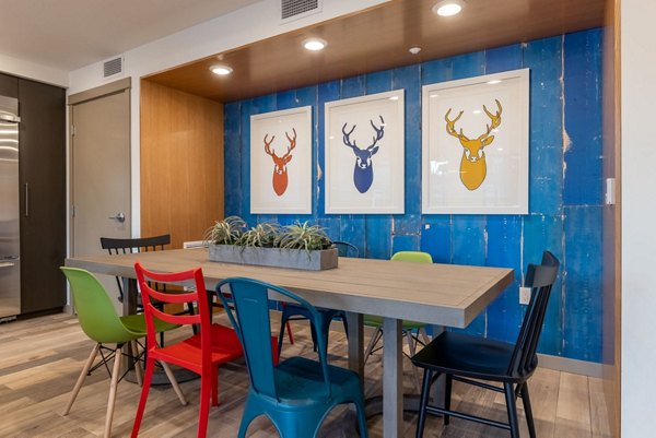 Clubhouse with modern design and seating area at Ethos Apartments luxury community