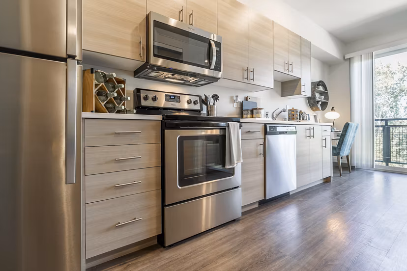 Spacious kitchen with modern appliances at Ethos Apartments