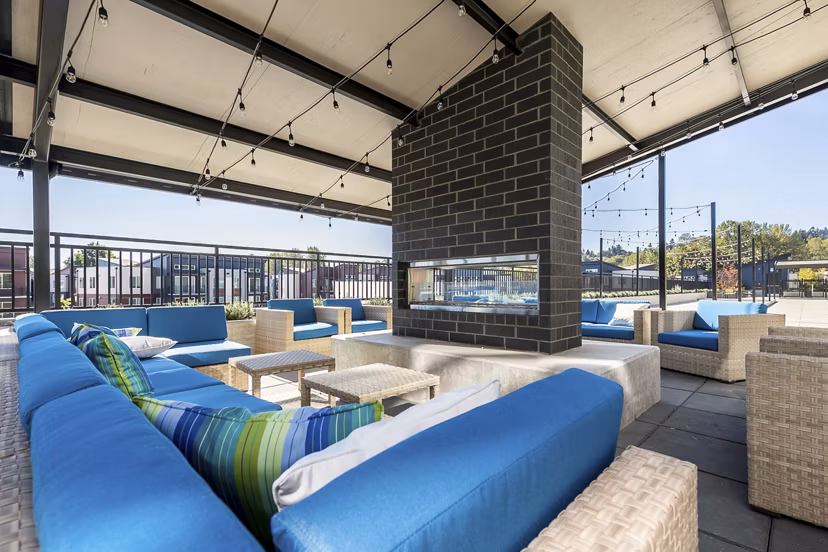 Cozy fire pit area at Ethos Apartments, ideal for socializing and relaxation