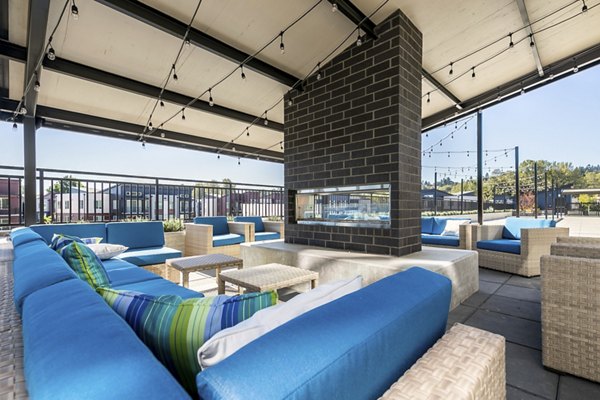 Cozy fire pit area at Ethos Apartments, ideal for socializing and relaxation