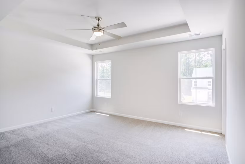 Spacious bedroom with modern decor at Berkeley Homes Apartments, luxury living by Greystar