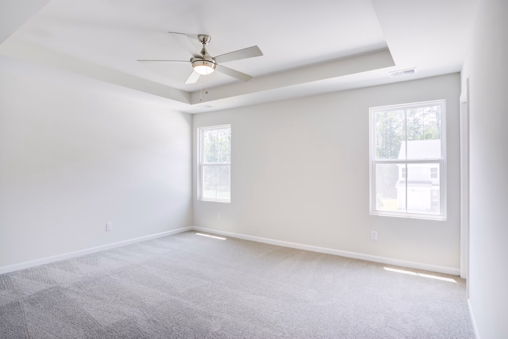 Spacious bedroom with modern decor at Berkeley Homes Apartments, luxury living by Greystar