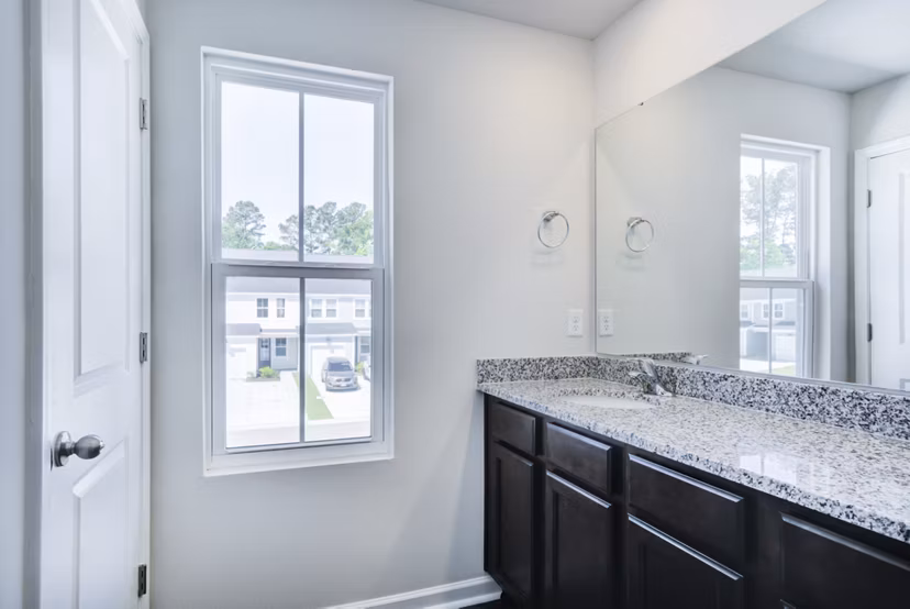 Modern bathroom featuring sleek fixtures at Berkeley Homes Apartments