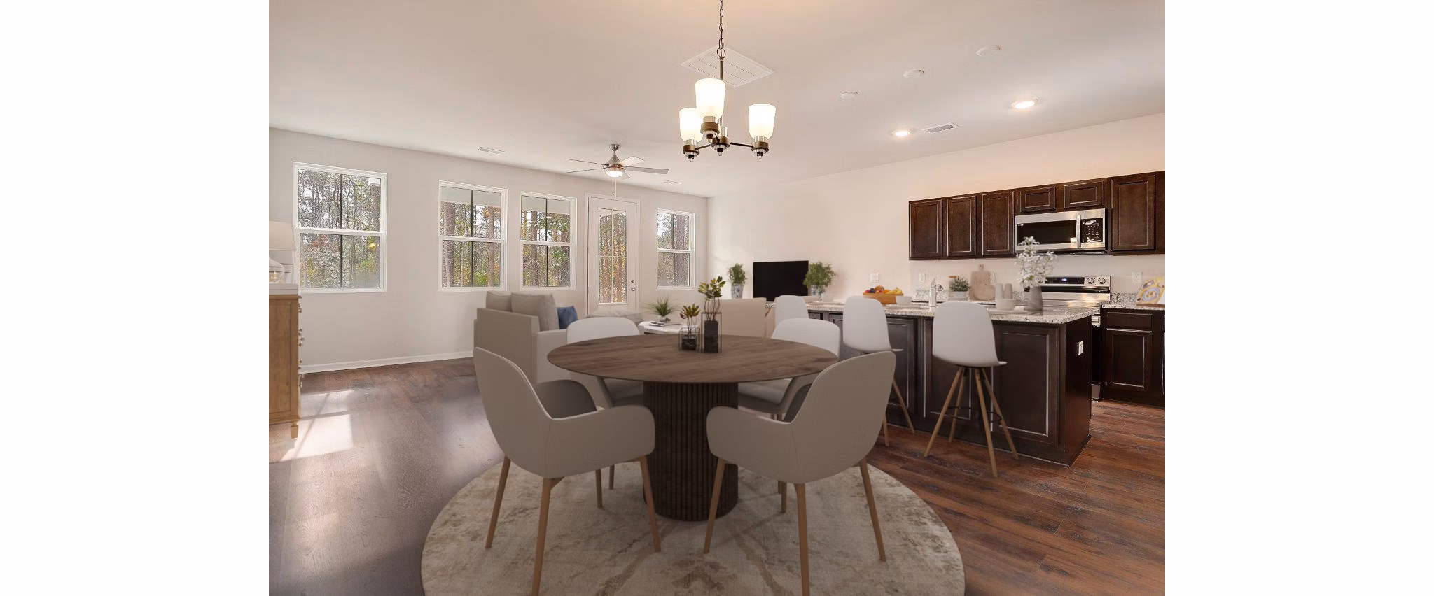 Elegant dining room with sleek furniture and modern lighting in Berkeley Homes Apartments