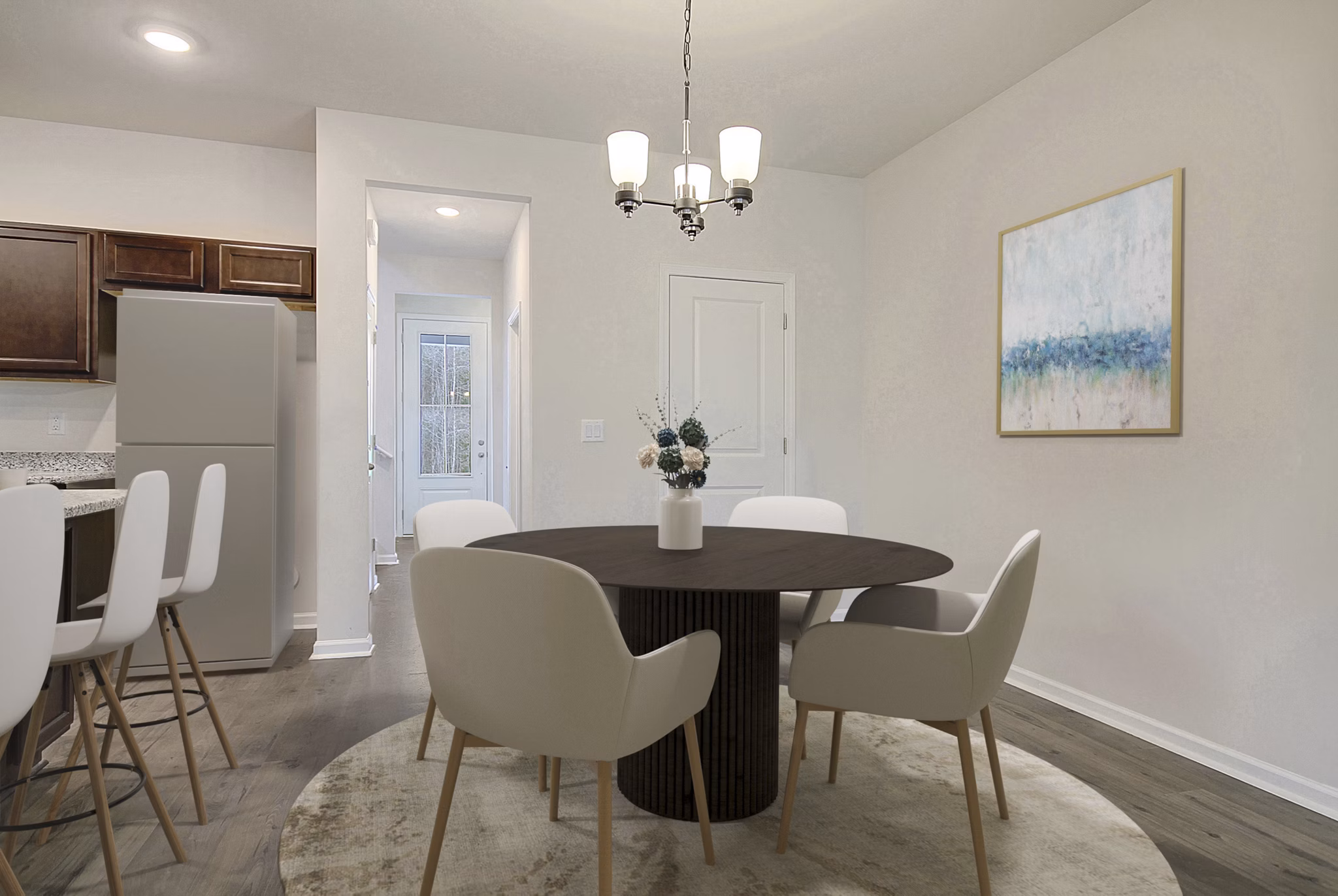Dining room featuring elegant furnishings and modern lighting at Berkeley Homes Apartments