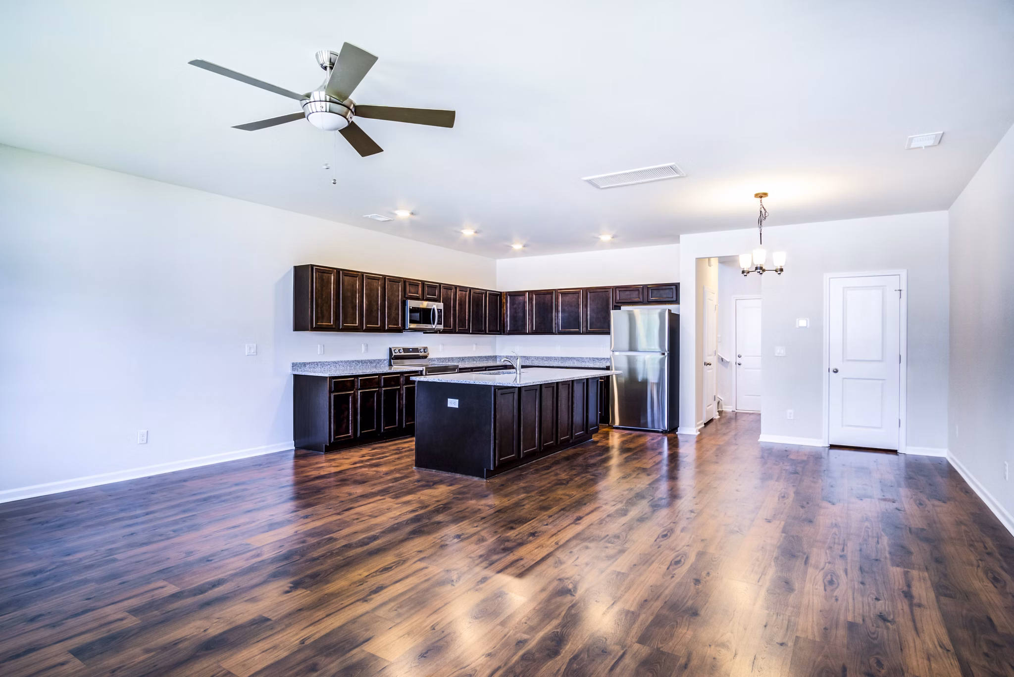 Spacious dining and living room with modern decor at Berkeley Homes Apartments