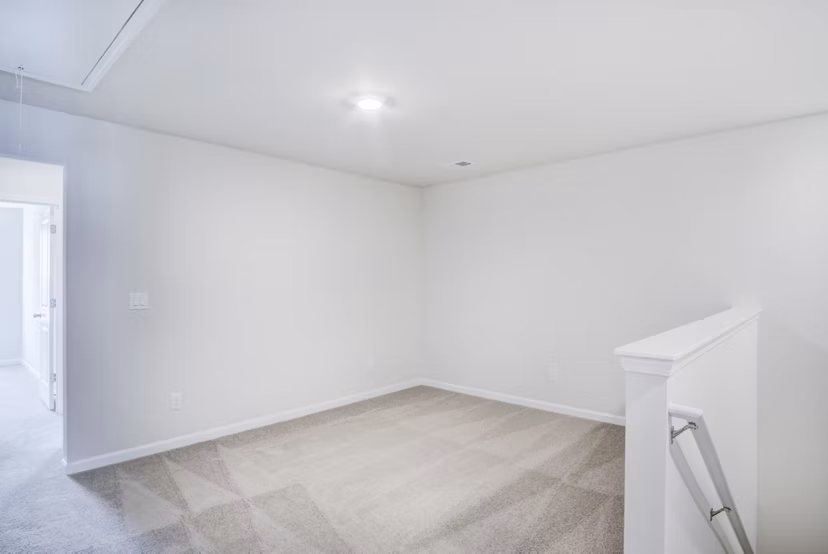 Home office with stylish desk and shelves in Berkeley Homes Apartments