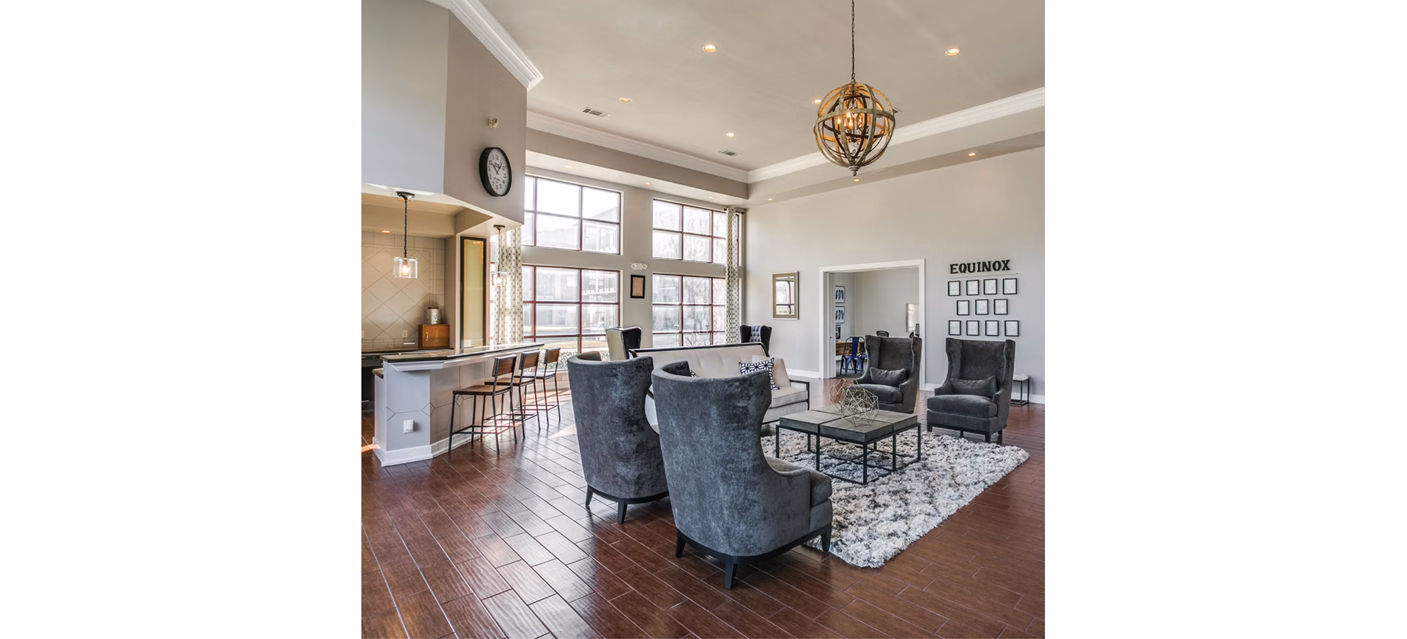 Modern clubhouse featuring stylish seating and gaming areas at Equinox on the Park Apartments