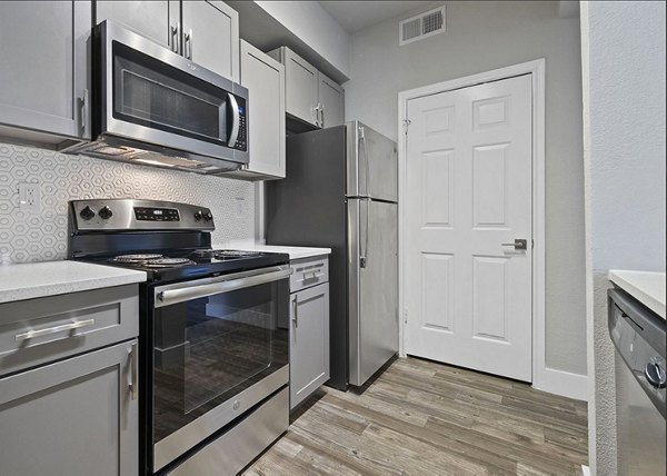 kitchen at Equinox on the Park Apartments