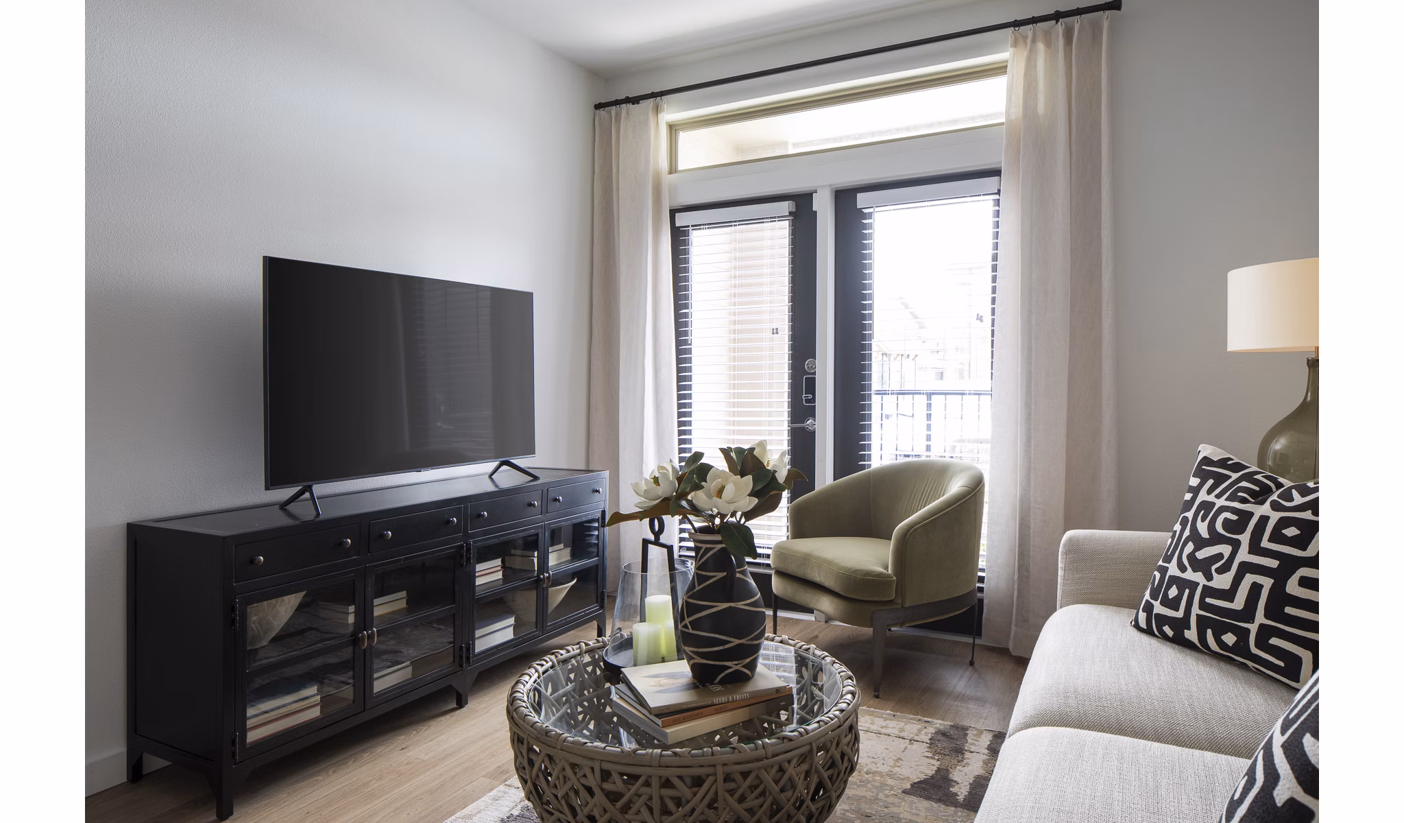 Spacious living room with modern decor in Broadstone Cross Creek Ranch Apartments