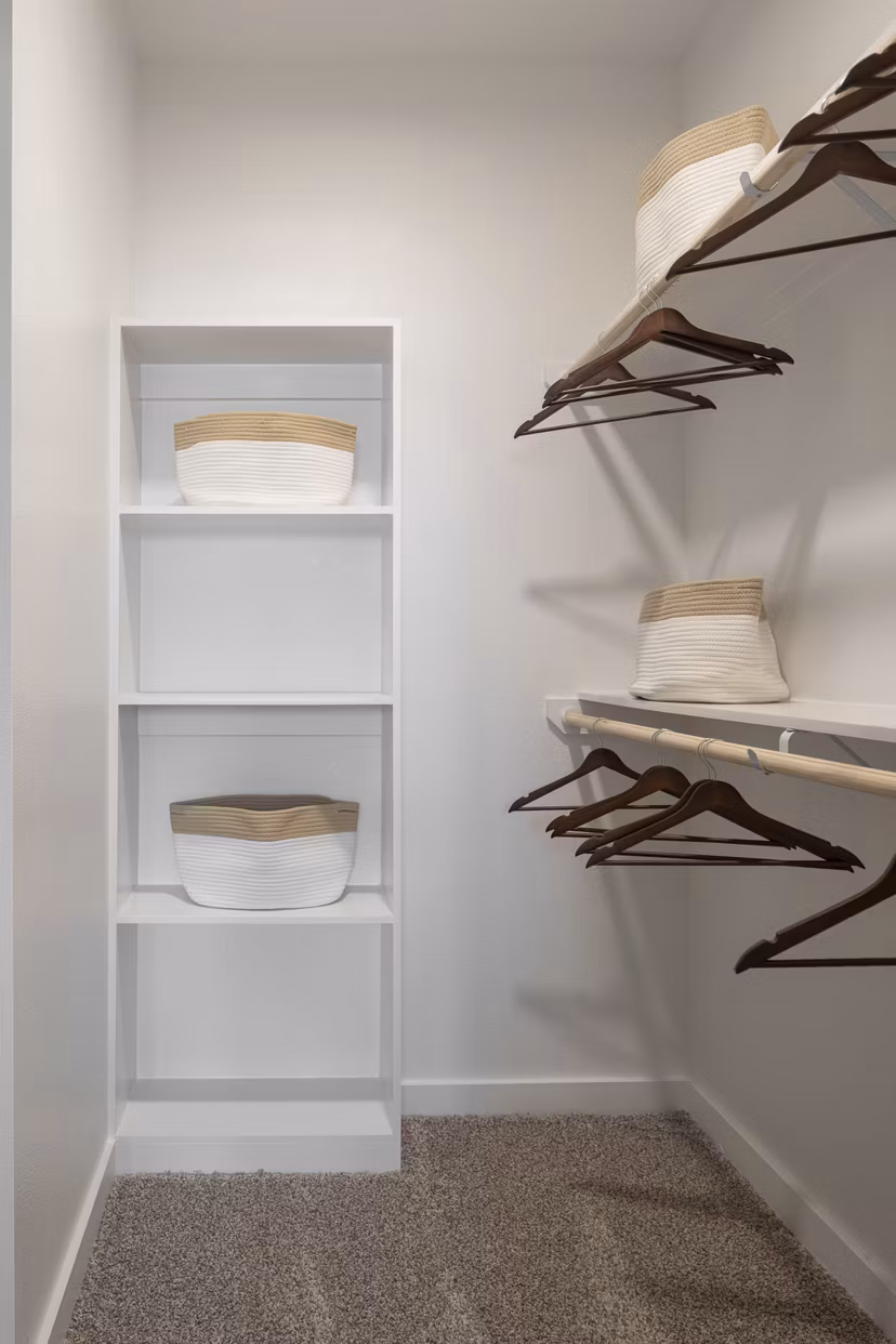 Spacious closet with built-in shelving in Broadstone Cross Creek Ranch Apartments