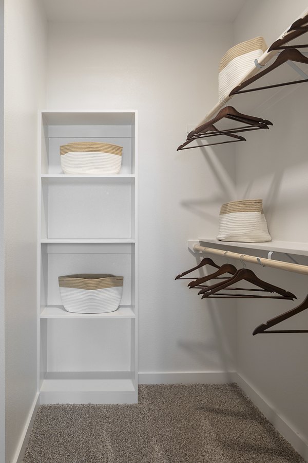Spacious closet with built-in shelving in Broadstone Cross Creek Ranch Apartments