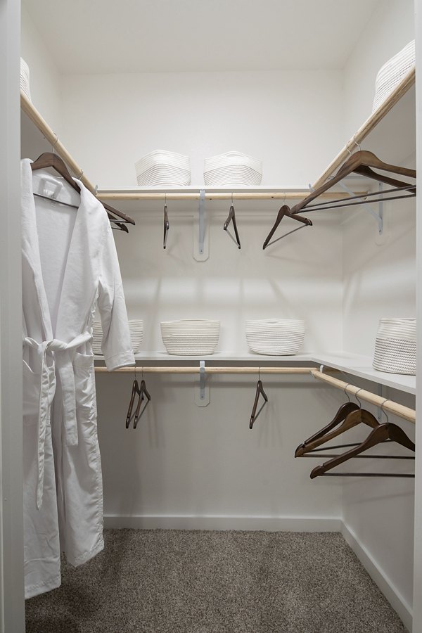 Spacious bedroom closet with ample storage space at Broadstone Cross Creek Ranch Apartments