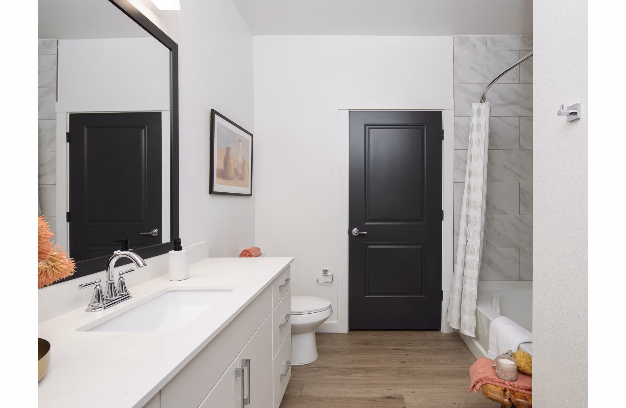 Modern bathroom featuring sleek fixtures and marble countertops in Broadstone Cross Creek Ranch Apartments