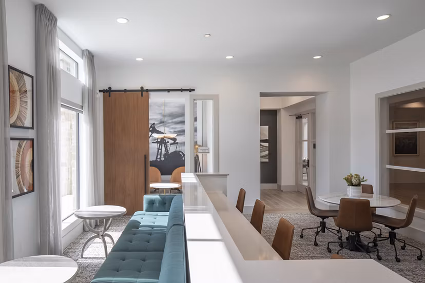 Clubhouse featuring elegant lounge spaces at Broadstone Cross Creek Ranch Apartments