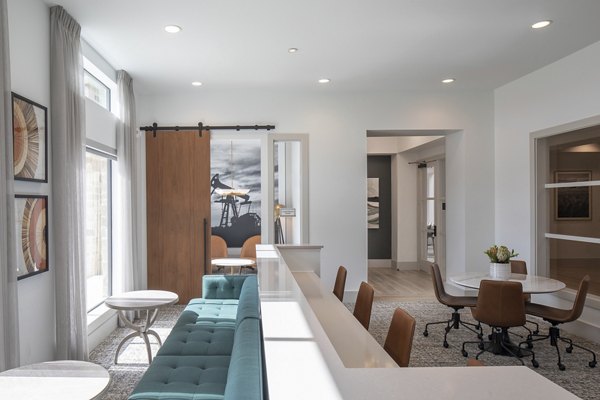 Clubhouse featuring elegant lounge spaces at Broadstone Cross Creek Ranch Apartments