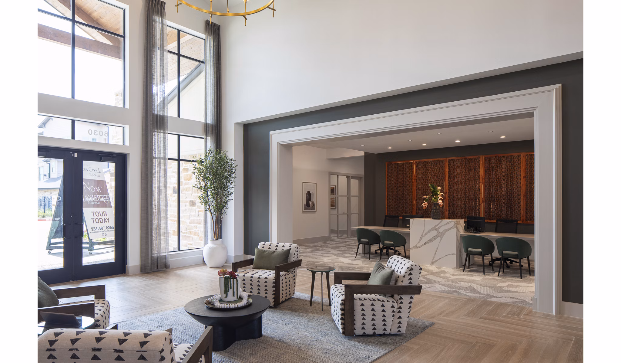 Modern clubhouse featuring lounge seating and billiards at Broadstone Cross Creek Ranch Apartments