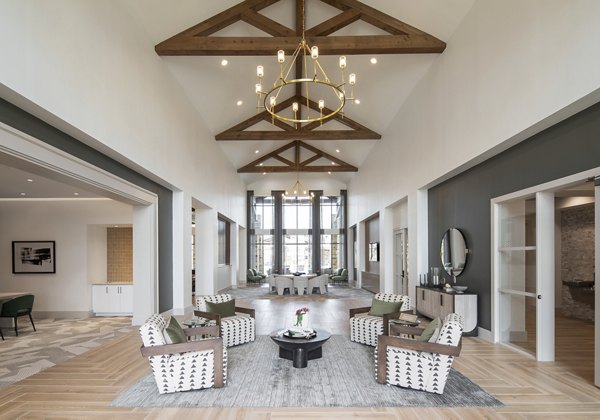 Stylish clubhouse with modern furniture at Broadstone Cross Creek Ranch Apartments