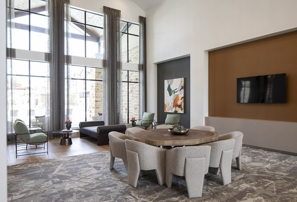 Modern clubhouse with sleek seating and decor at Broadstone Cross Creek Ranch Apartments