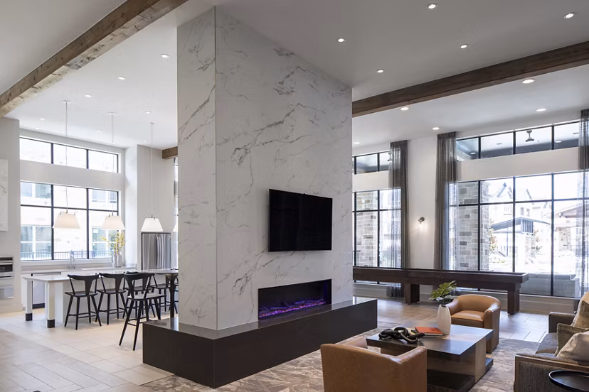 Clubhouse featuring modern design and comfortable seating at Broadstone Cross Creek Ranch Apartments