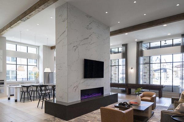 Clubhouse featuring modern design and comfortable seating at Broadstone Cross Creek Ranch Apartments