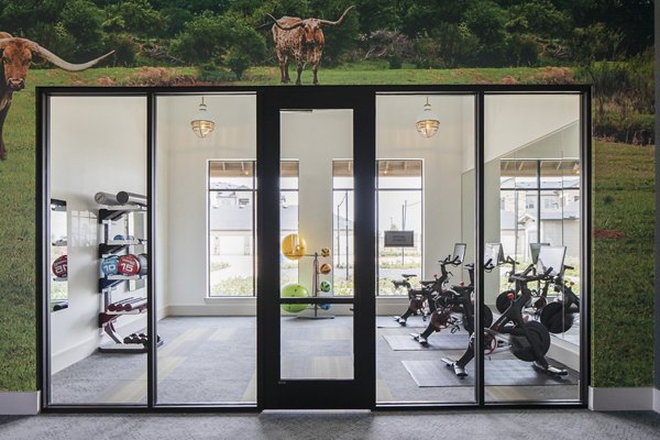 Fitness center with state-of-the-art equipment at Broadstone Cross Creek Ranch Apartments