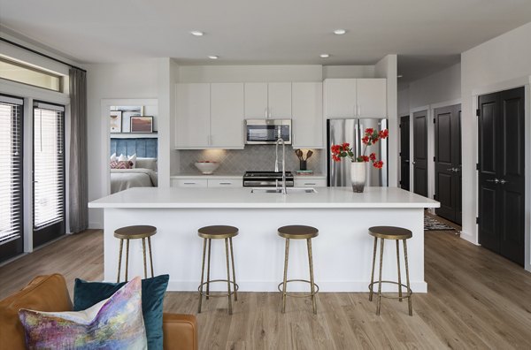 Modern kitchen featuring stainless steel appliances at Broadstone Cross Creek Ranch Apartments