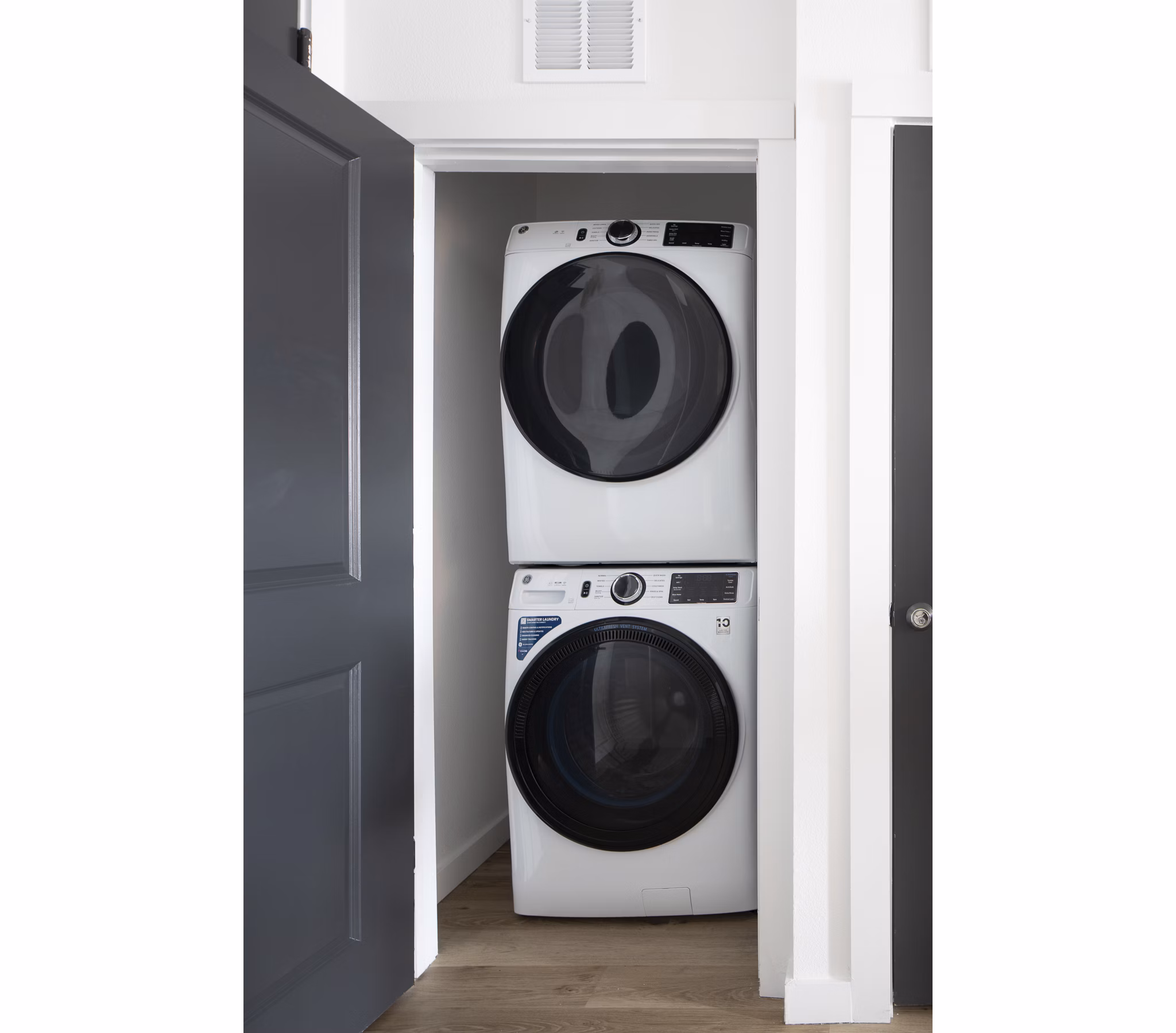 Laundry facilities featuring modern washers and dryers in Broadstone Cross Creek Ranch Apartments