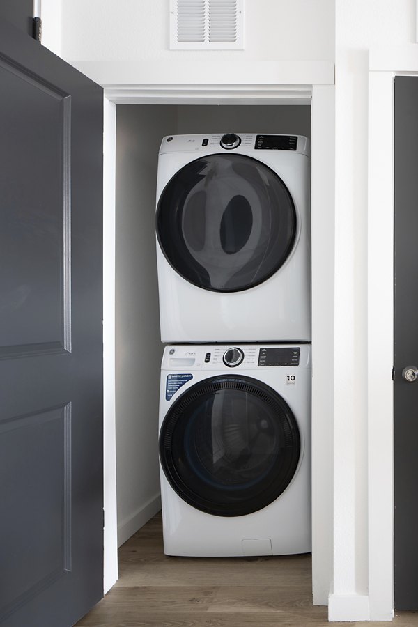 Laundry facilities featuring modern washers and dryers in Broadstone Cross Creek Ranch Apartments
