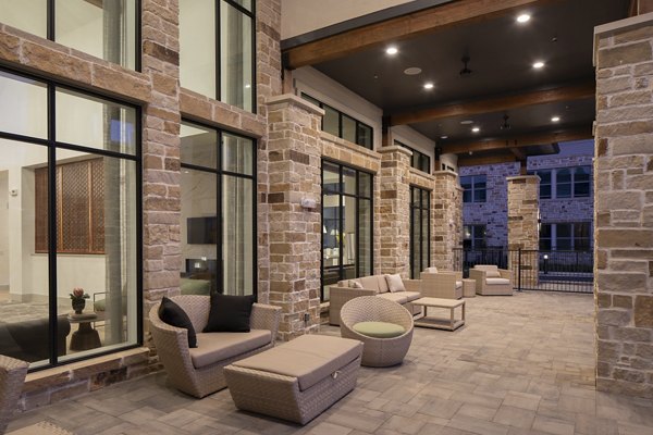 Spacious patio with outdoor seating at Broadstone Cross Creek Ranch Apartments providing relaxation and leisure in a luxurious setting