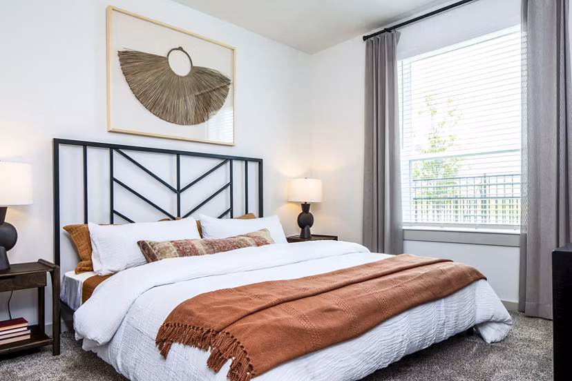 Cozy bedroom with modern design at Broadstone Jordan Ranch Apartments