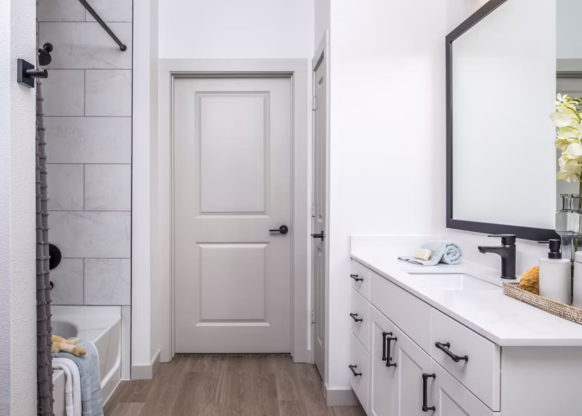 Modern bathroom with sleek fixtures and marble countertops in Broadstone Jordan Ranch Apartments