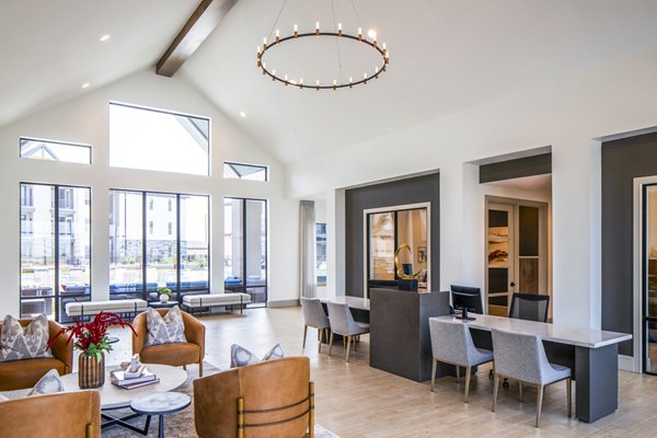 Clubhouse featuring modern interiors and communal spaces at Broadstone Jordan Ranch Apartments