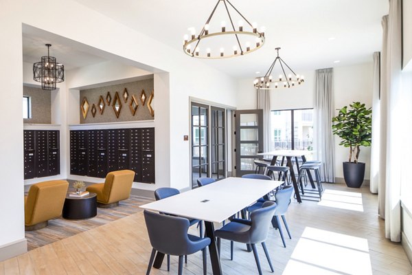 Spacious clubhouse with modern decor at Broadstone Jordan Ranch Apartments offering luxury amenities and social spaces