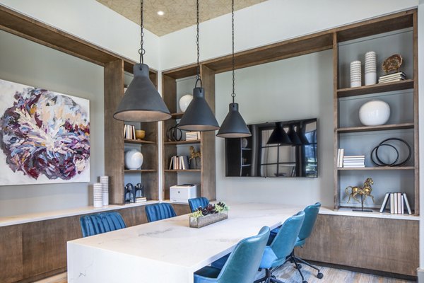 Clubhouse featuring modern design and communal seating at Broadstone Jordan Ranch Apartments Perfect for social gatherings and events