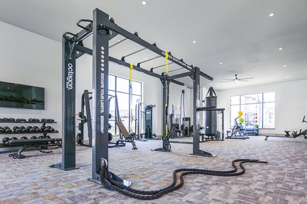 Fitness center equipped with modern gym equipment at Broadstone Jordan Ranch Apartments, offering residents a healthy lifestyle option