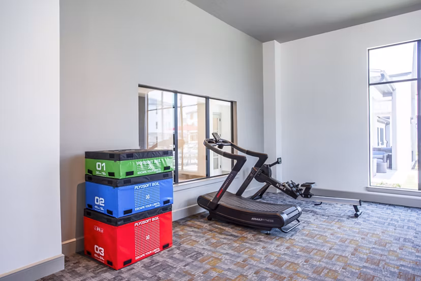 State-of-the-art fitness center featuring modern equipment at Broadstone Jordan Ranch Apartments