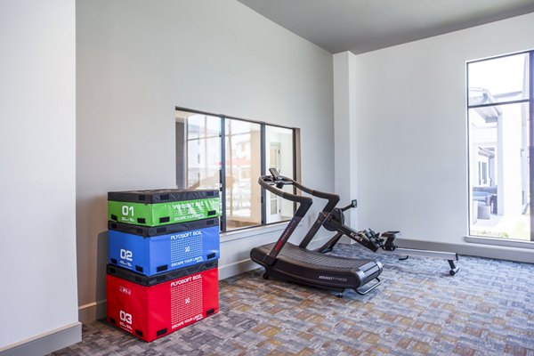 State-of-the-art fitness center featuring modern equipment at Broadstone Jordan Ranch Apartments