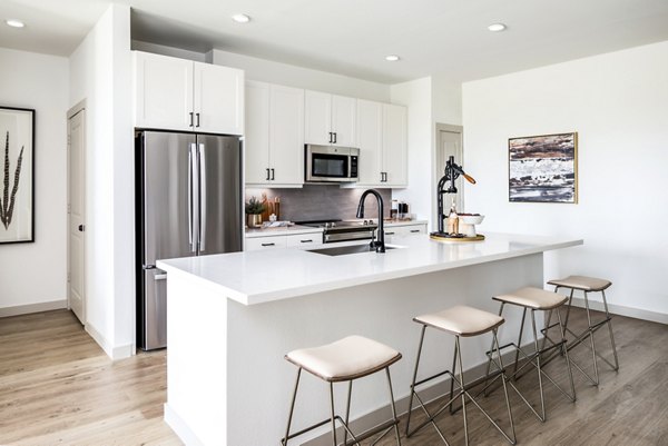 Modern kitchen with stainless steel appliances at Broadstone Jordan Ranch Apartments, perfect for luxury living in San Antonio